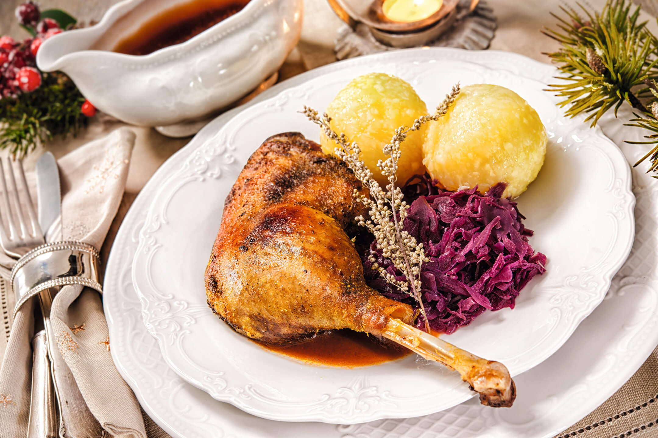 goose leg with dumpling and red cabbage