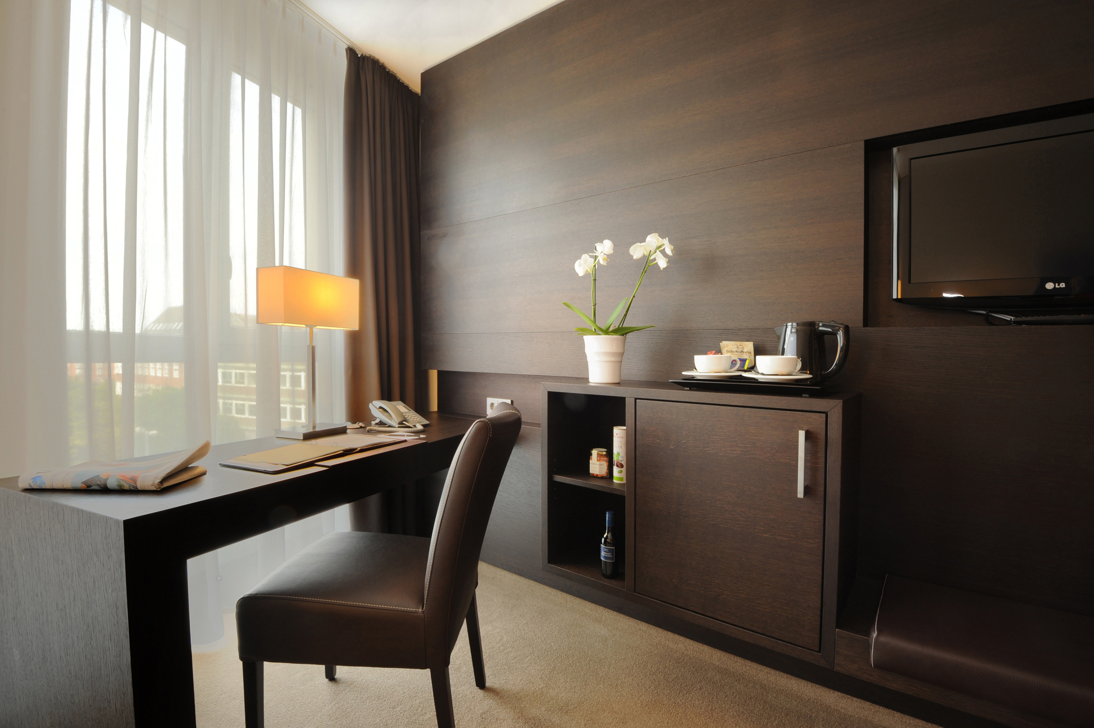 Desk and TV in the Superior Room of the ATLANTIC Grand Hotel in the city centre of Bremen 