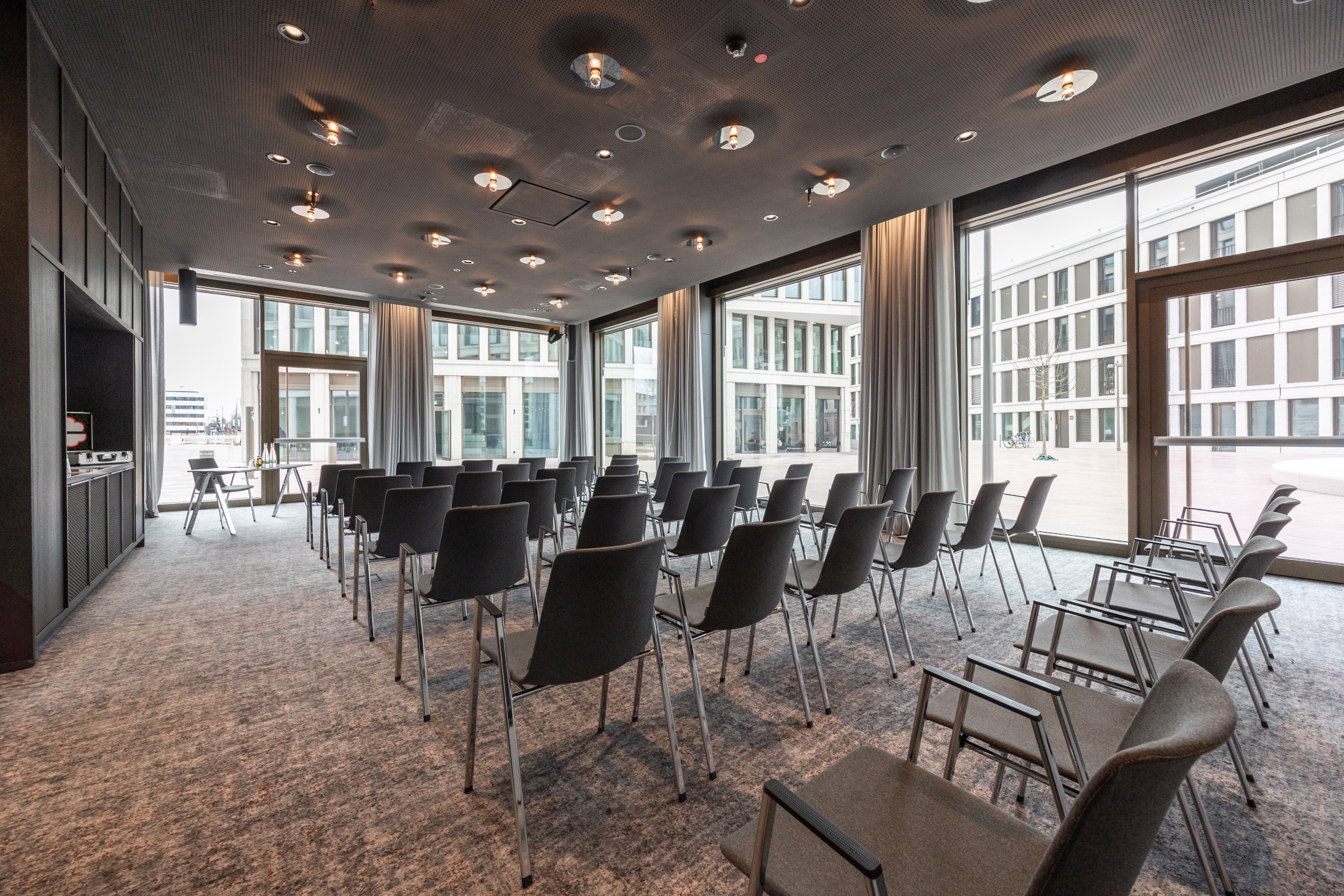 The Europaplatz meeting room at the ATLANTIC Hotel Heidelberg The Europaplatz meeting room at the ATLANTIC Hotel Heidelberg, featuring parliamentary-style seating