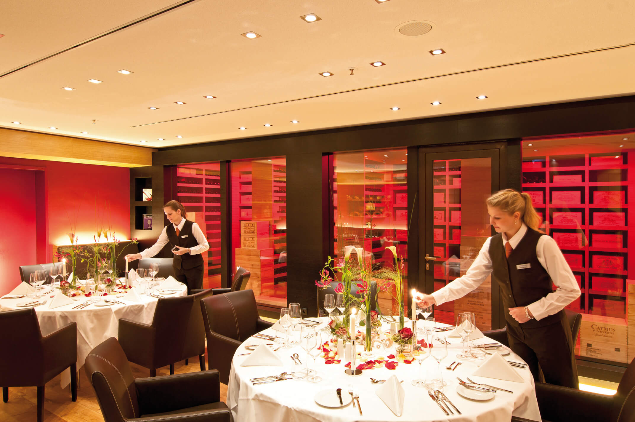 Round tables in the wine cellar of the ATLANTIC Hotel Kiel