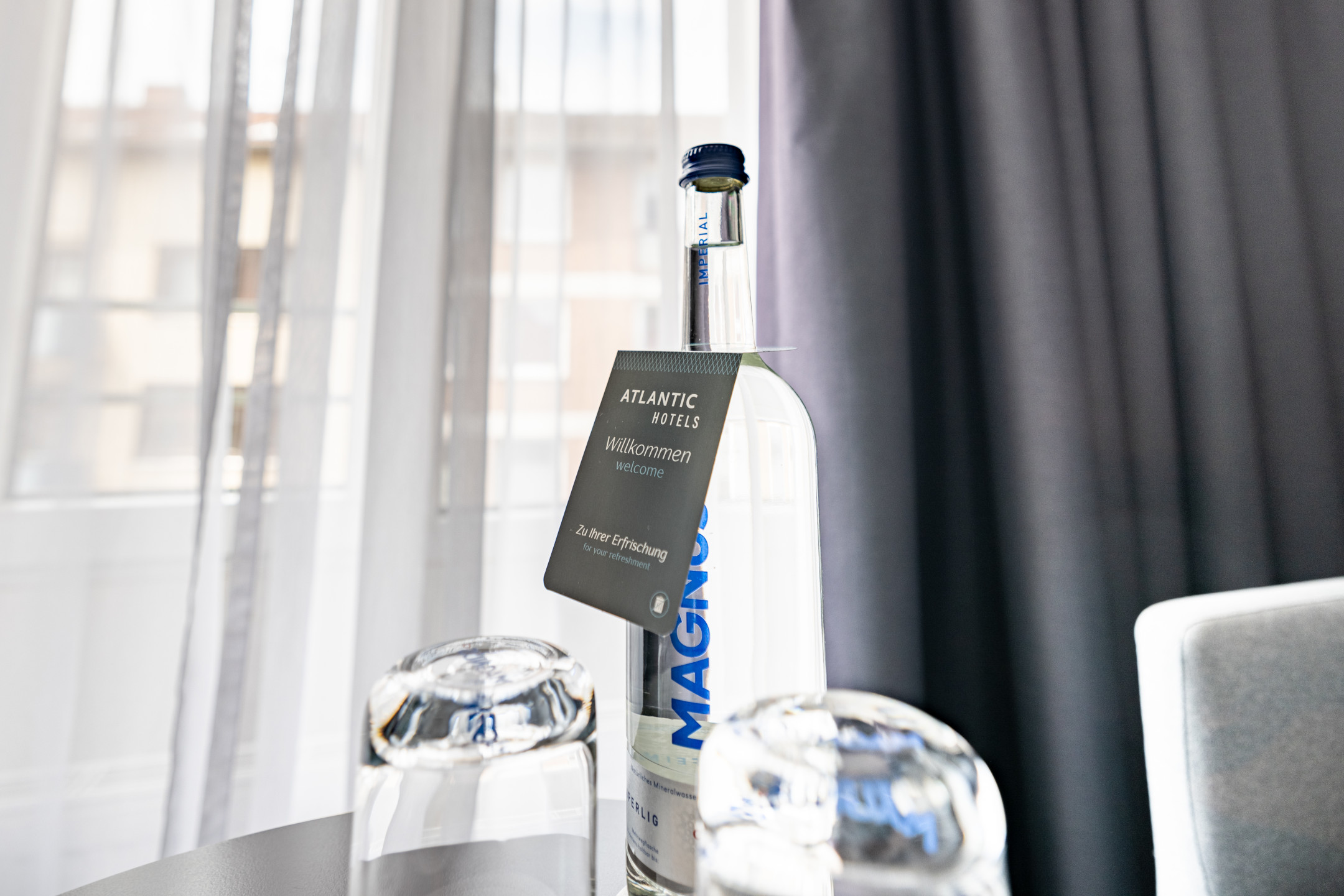 ATLANTIC Hotel Vegesack room equipment welcome water