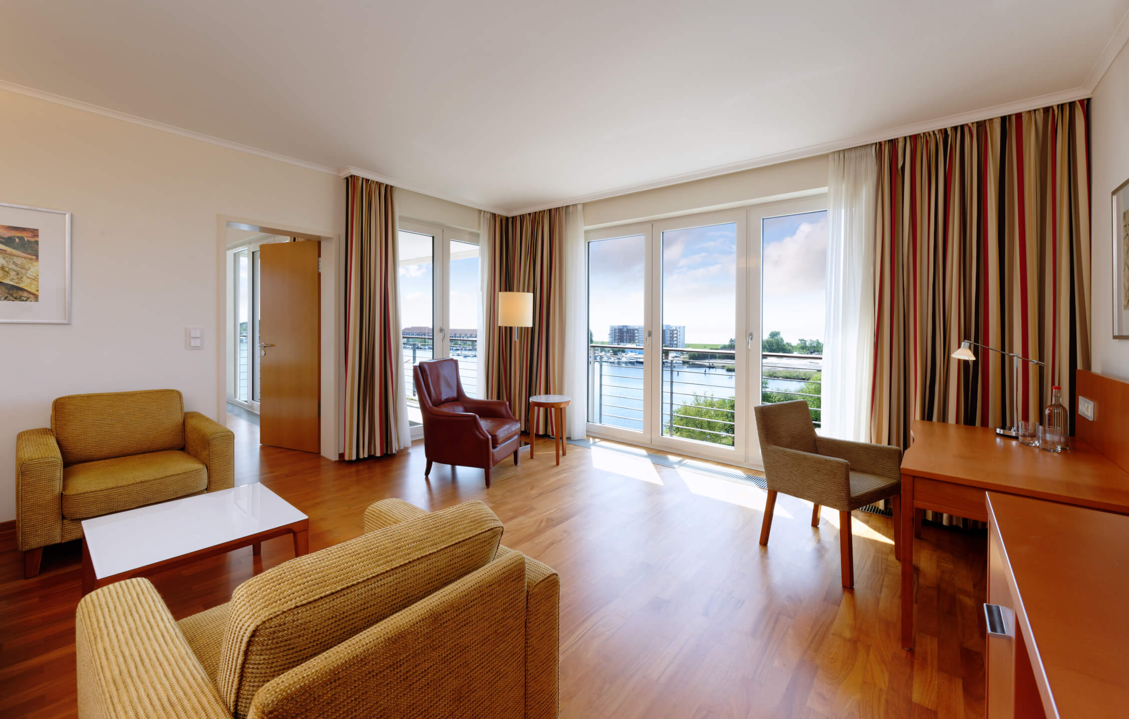 View into the living room of the Executive Suite in the ATLANTIC Hotel Wilhelmshaven 