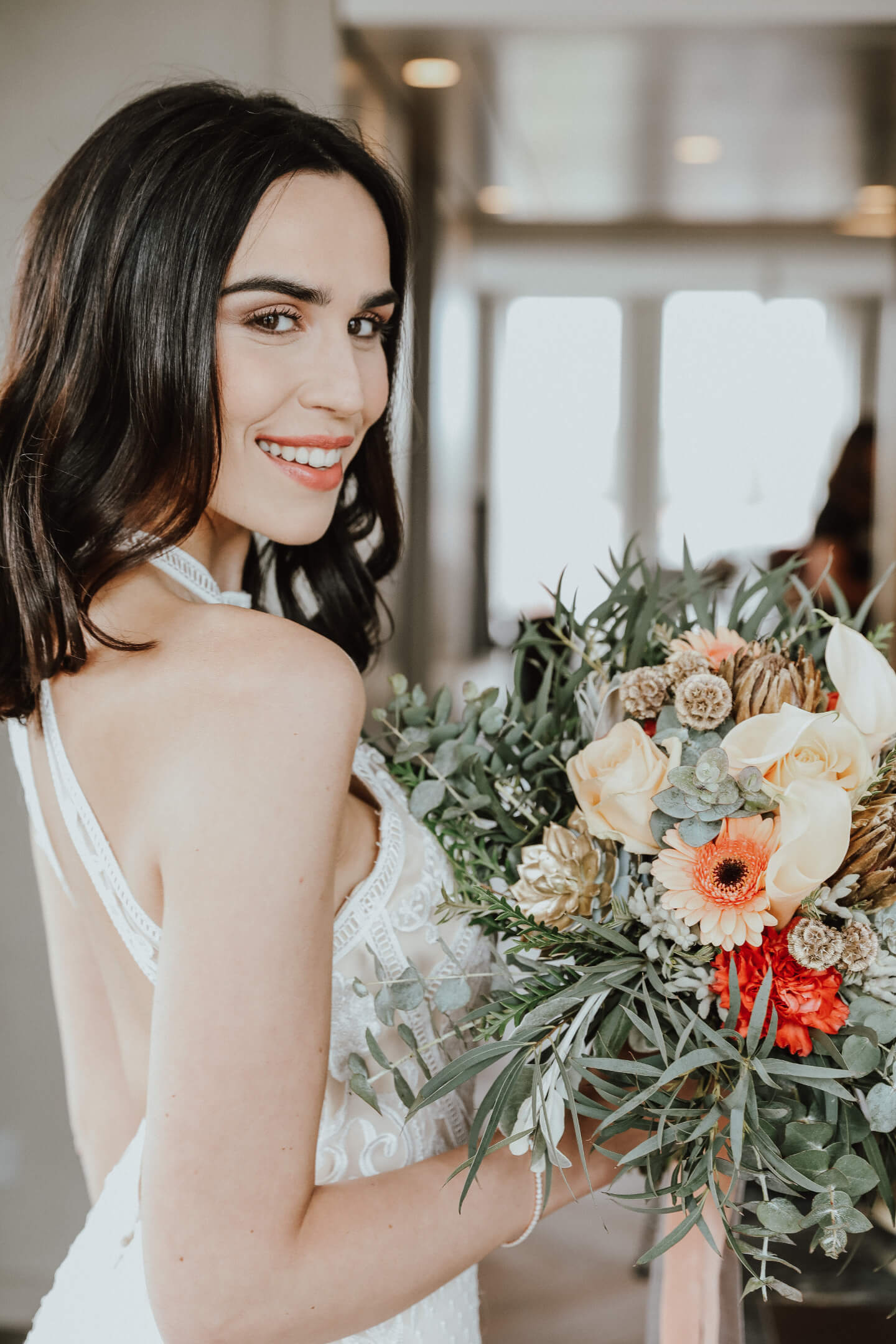 portrait photo of the bride with bridal flowers