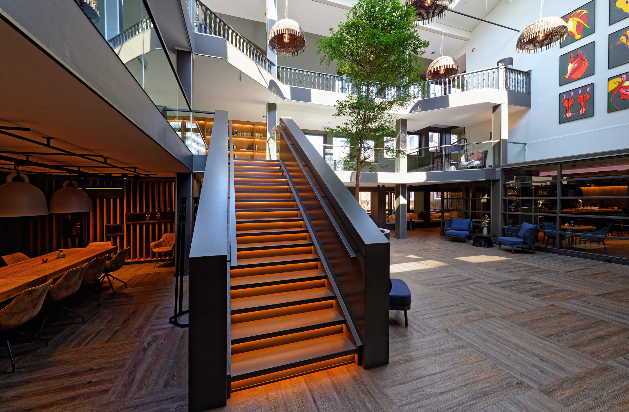 Lobby with staircase at the ATLANTIC Hotel Landgut Horn