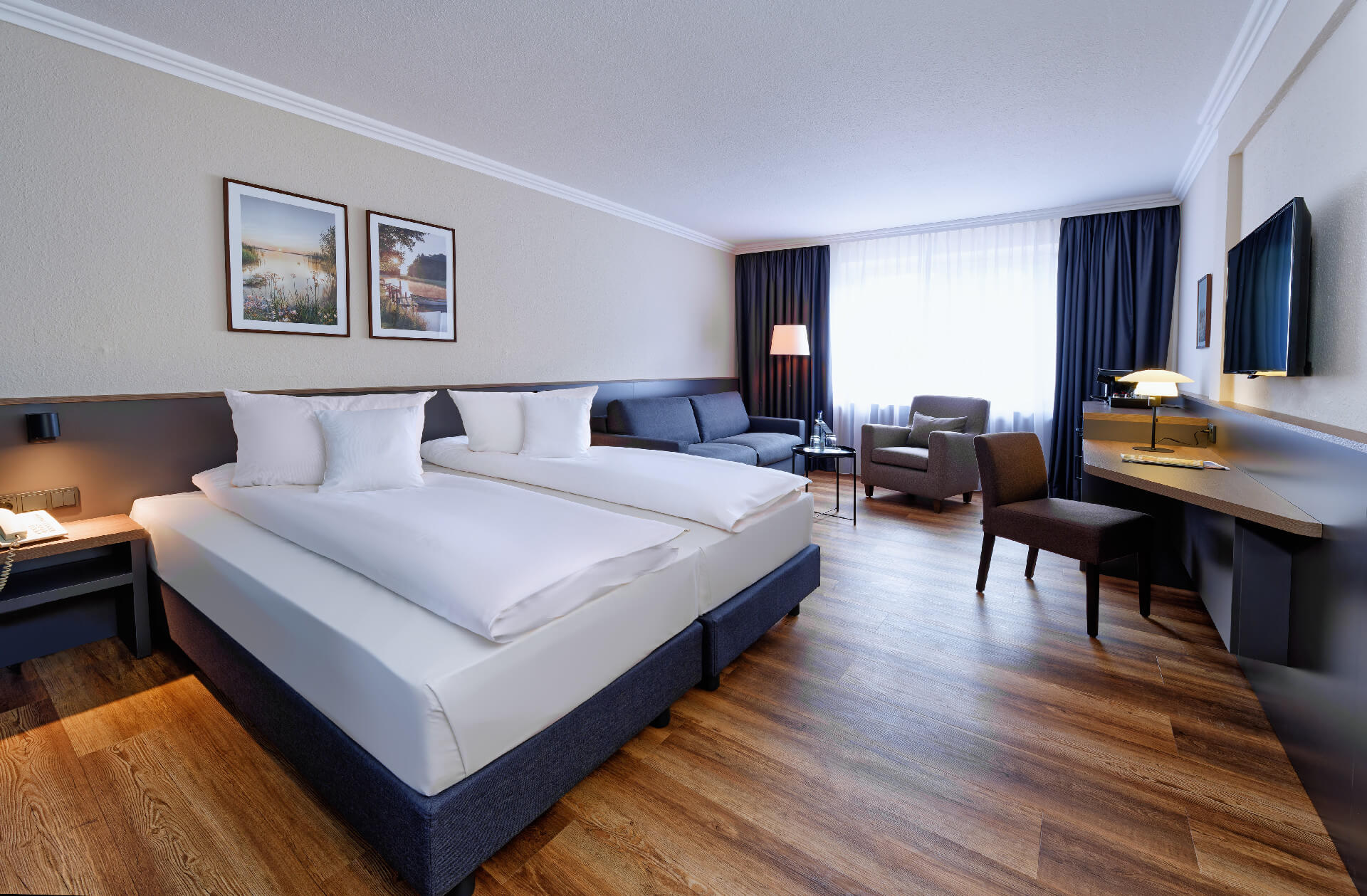 Interior view of Deluxe Zimmer at the ATLANTIC Hotel Landgut Horn