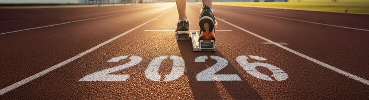 Trekking Bahn mit der Zahl 2026 und einer Läuferin