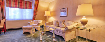 Living area in the suite at the ATLANTIC Hotel Landgut Horn