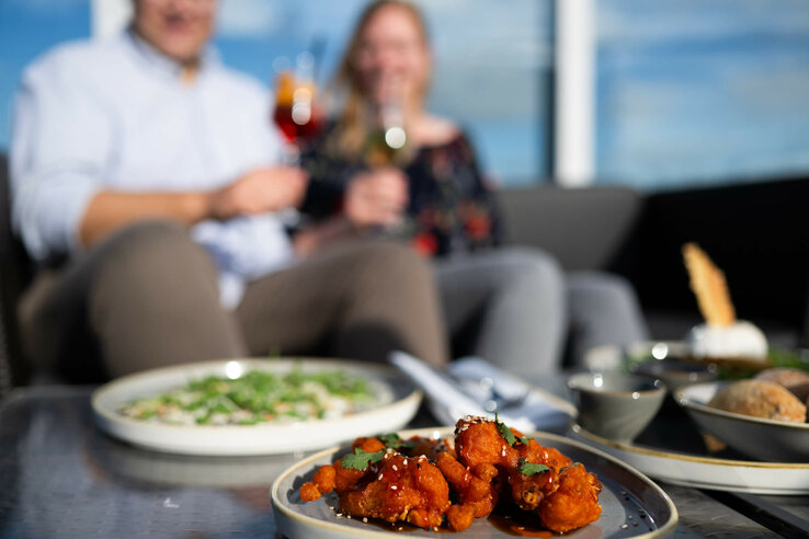 A selection of dishes on the roof terrace of Bar Deck 8 Kiel in good weather