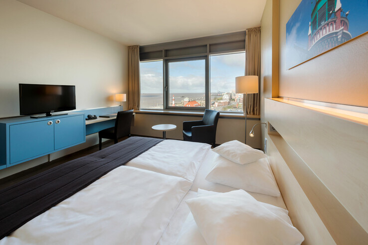 Our Superior Double Room in the ATLANTIC Hotel SAIL City in Bremerhaven, located directly at the Weser