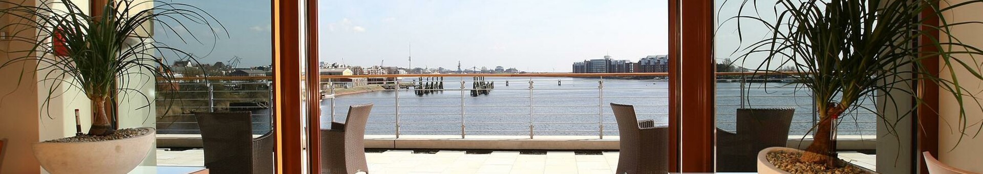 View over the harbour from the restaurant Harbour View in the ATLANTIC Hotel Wilhelmshaven 