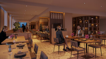Das moderne Restaurant im ATLANTIC Hotel Frankfurt mit verschiedenen Tischgruppen, warmen Licht und hölzernen Trennwänden.