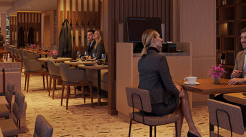 Das moderne Restaurant im ATLANTIC Hotel Frankfurt mit verschiedenen Tischgruppen, warmen Licht und hölzernen Trennwänden.