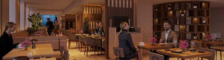 The modern restaurant at the ATLANTIC Hotel Frankfurt, featuring various seating areas, warm lighting and wooden partitions.