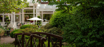 Garden at the ATLANTIC Hotel Landgut Horn in Bremen