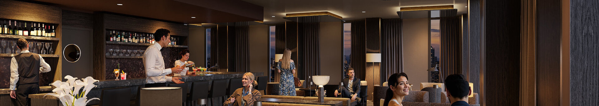 Die stimmungsvolle, moderne Bar im ATLANTIC Hotel Frankfurt, mit indirekter Deckenbeleuchtung, dunkelgrauen Wänden, verschiedenen Sesseln als Sitzmöglichkeiten und Dekoration in dunklen Holztönen.