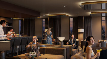 Die stimmungsvolle, moderne Bar im ATLANTIC Hotel Frankfurt, mit indirekter Deckenbeleuchtung, dunkelgrauen Wänden, verschiedenen Sesseln als Sitzmöglichkeiten und Dekoration in dunklen Holztönen.