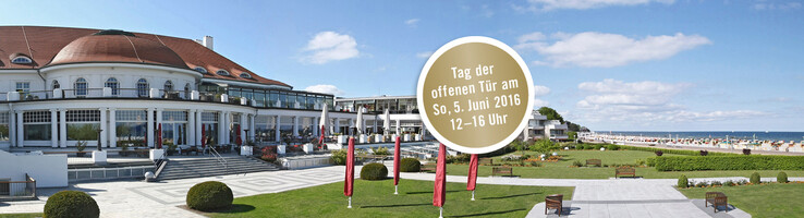 Tag der offenen Tür im ATLANTIC Grand Hotel Travemünde ATLANTIC Grand Hotel Travemünde mit Garten, Terrasse und Blick auf die Ostsee bei sonnigem Wetter.