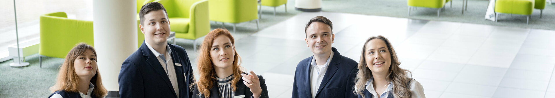 Reception team at the ATLANTIC Hotel an der Galopprennbahn