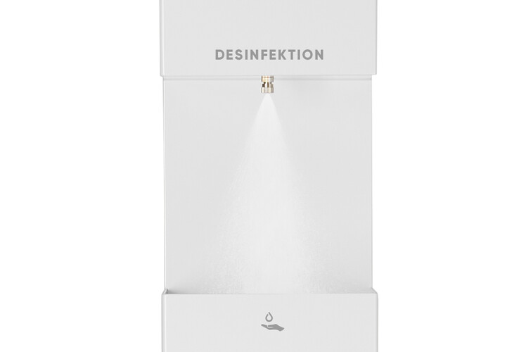 Disinfectant dispenser in the ATLANTIC Hotel Sail City, Bremerhaven, sprays disinfectant for hygienic hand cleaning.