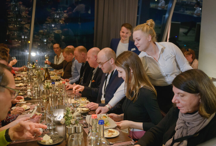 Guests enjoy an elegant dinner at the ATLANTIC Hotel Sail City, Bremerhaven.