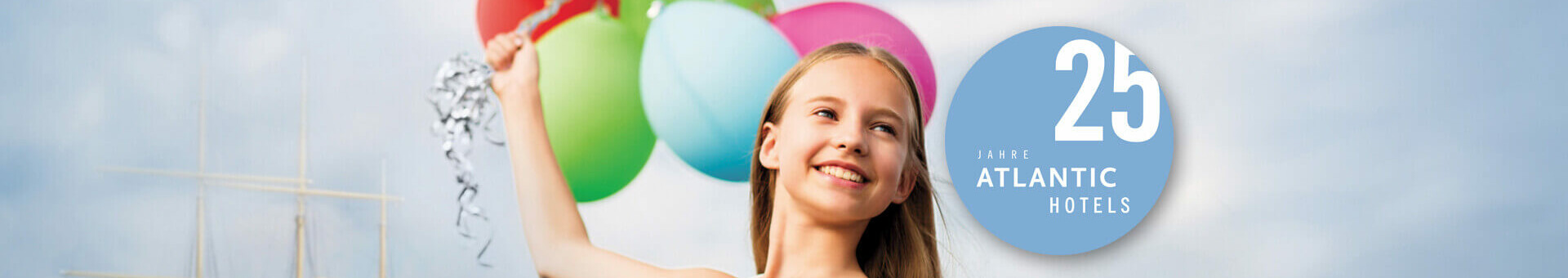 25 years ATLANTIC Hotels Girl with colorful balloons smiling, blue sky in the background, "25 years of Atlantic Hotels" in a circle.
