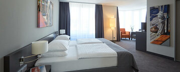 Interior view of the generously furnished Studio in the ATLANTIC Hotel Vegesack in Bremen 