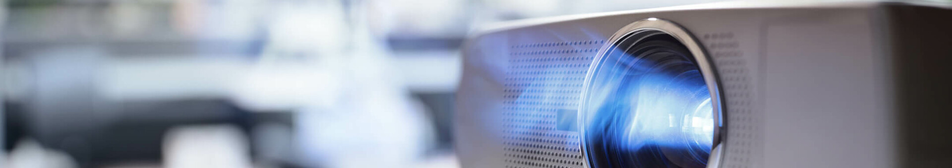 Projector Modern projector in a conference room of the ATLANTIC Hotel Sail City Bremerhaven, blurred background.