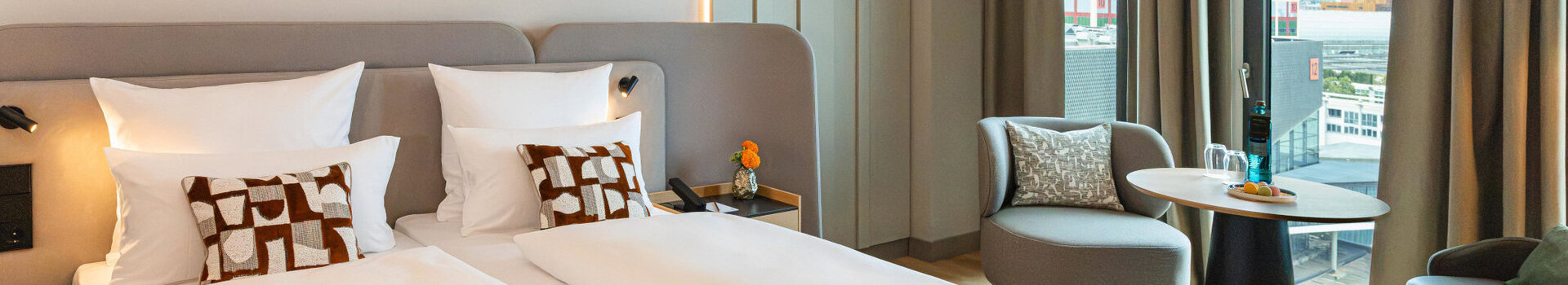 A view of the bed and the seating area in the Superior Double Room.