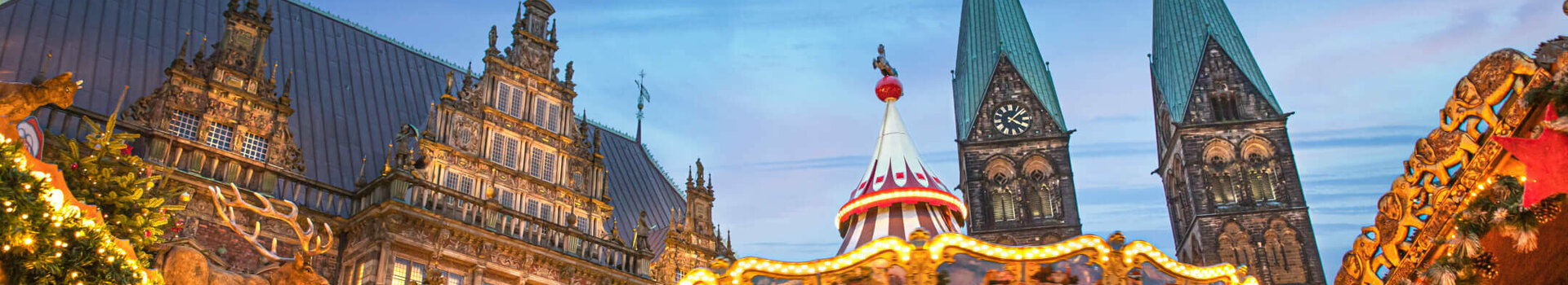 Bremen Christmas market with carousel and stylish lighting against a dark sky