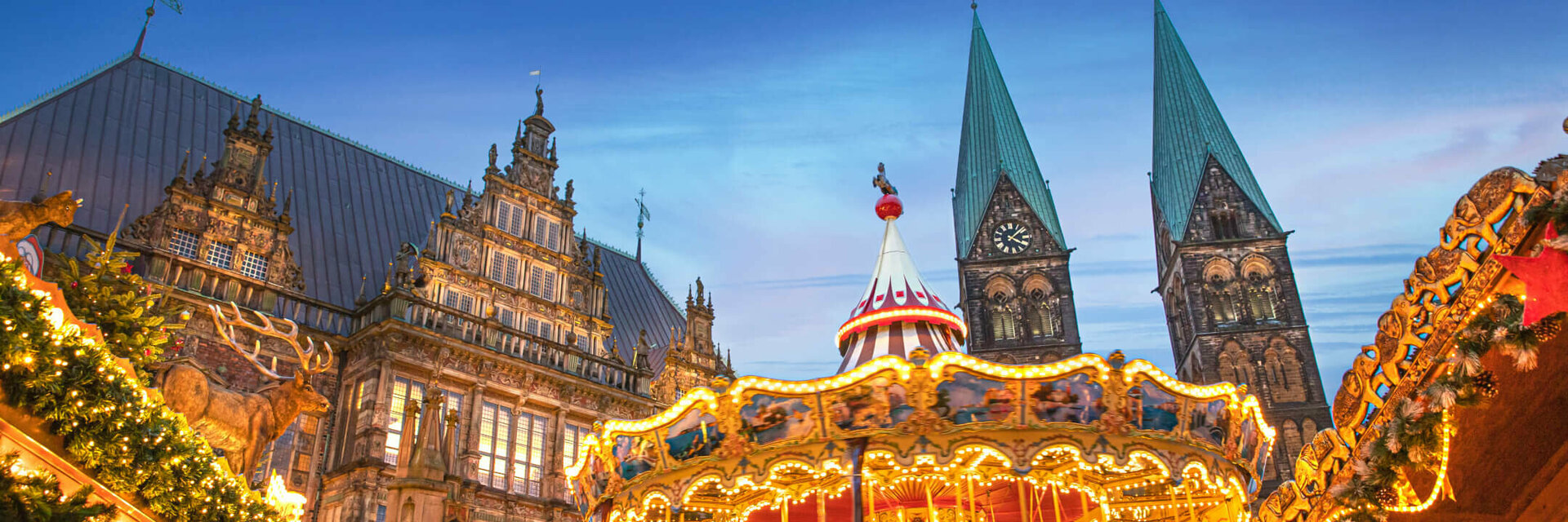 Bremen Christmas market with carousel and stylish lighting against a dark sky