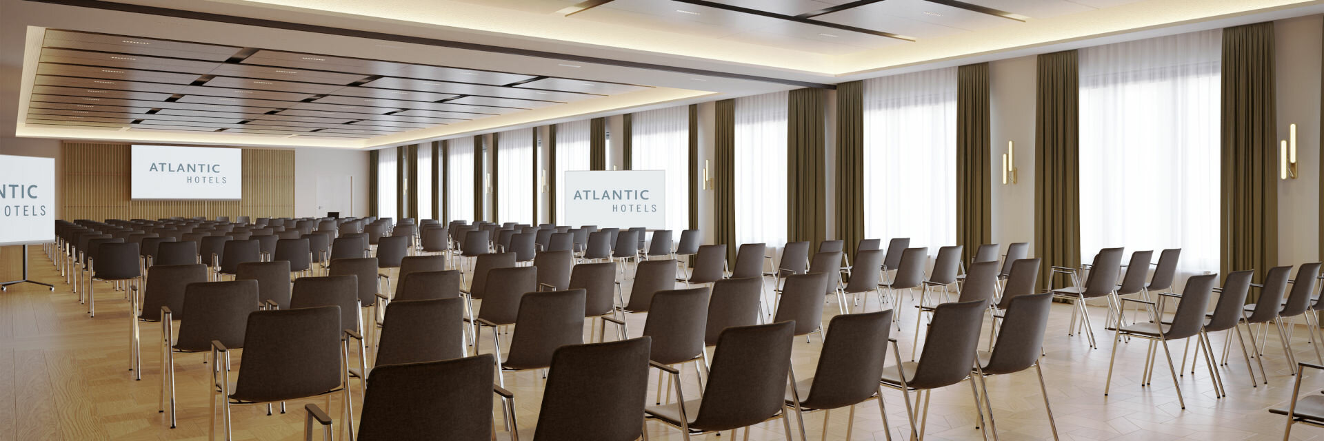 Rendering of a conference room at the ATLANTIC Hotel Frankfurt. Rows of tables are arranged in a modern and bright room.