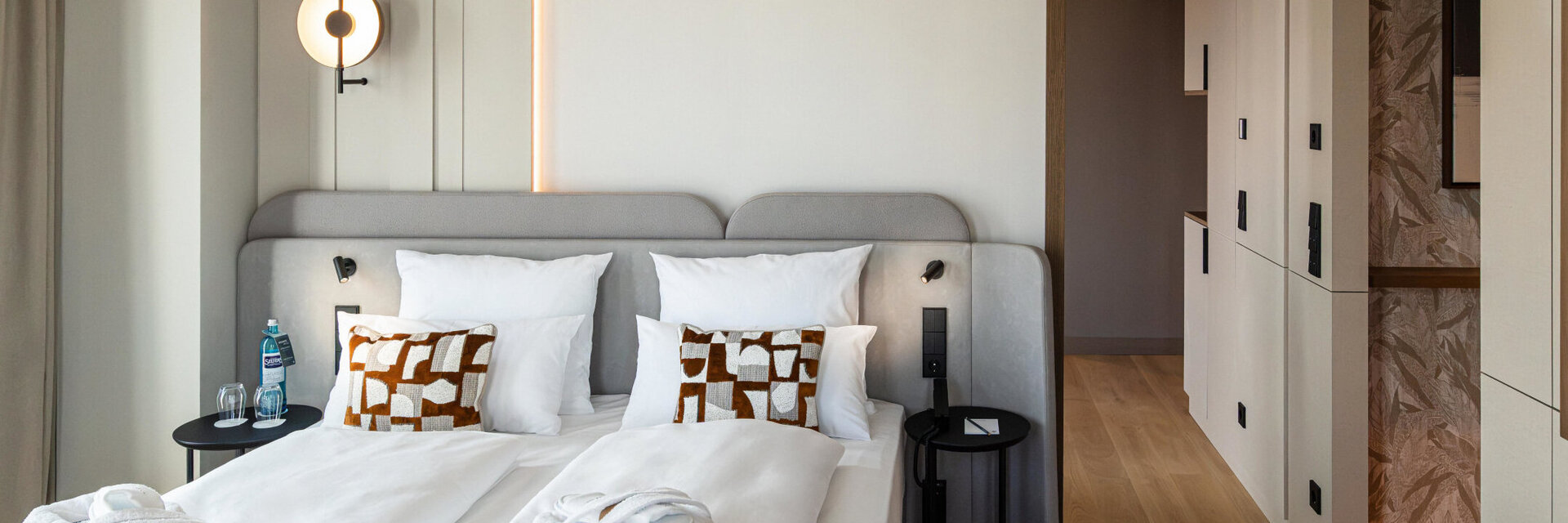 A comfortable double bed in the Skyline Suite.