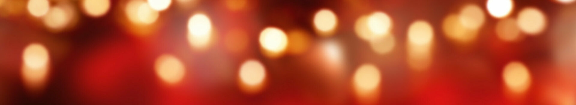 Holzboden vor unscharfem, rot-goldenem Bokeh-Hintergrund im ATLANTIC Grand Hotel Bremen.