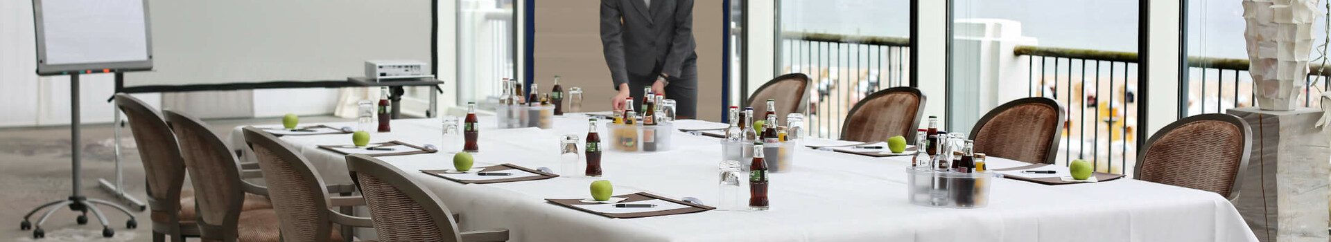SMART Meetings at ATLANTIC Grand Hotel Travemünde Bright conference room at the ATLANTIC Grand Hotel Travemünde with table setting and sea view.