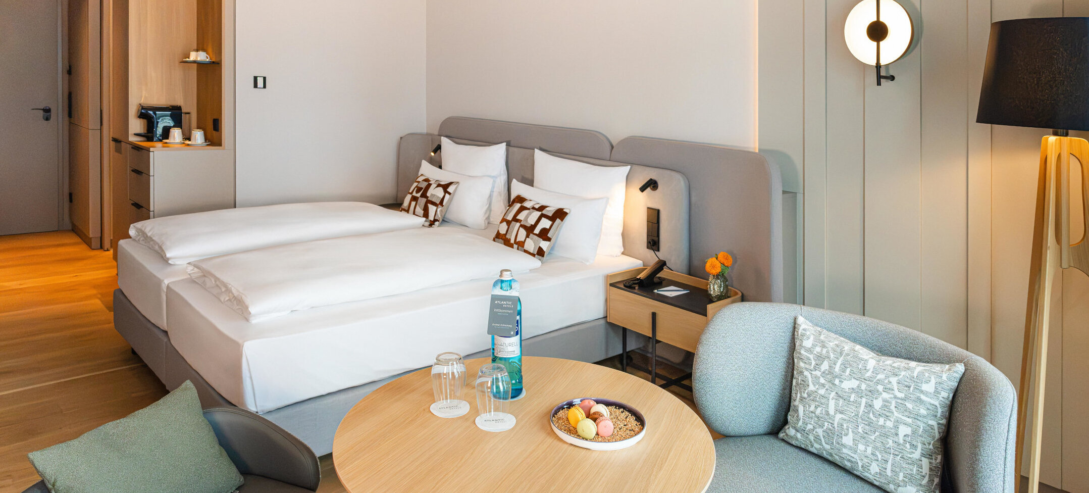 A view of the bed and the seating area in the Superior Double Room.