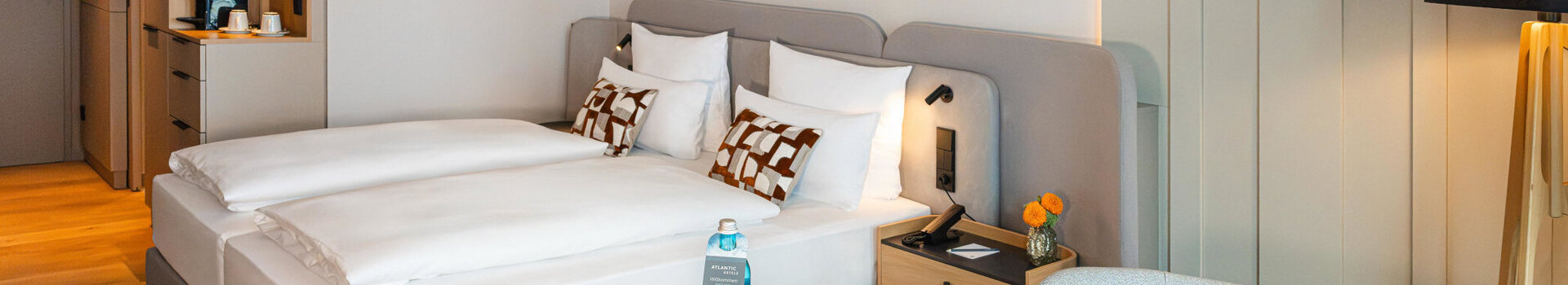 A view of the bed and the seating area in the Superior Double Room.