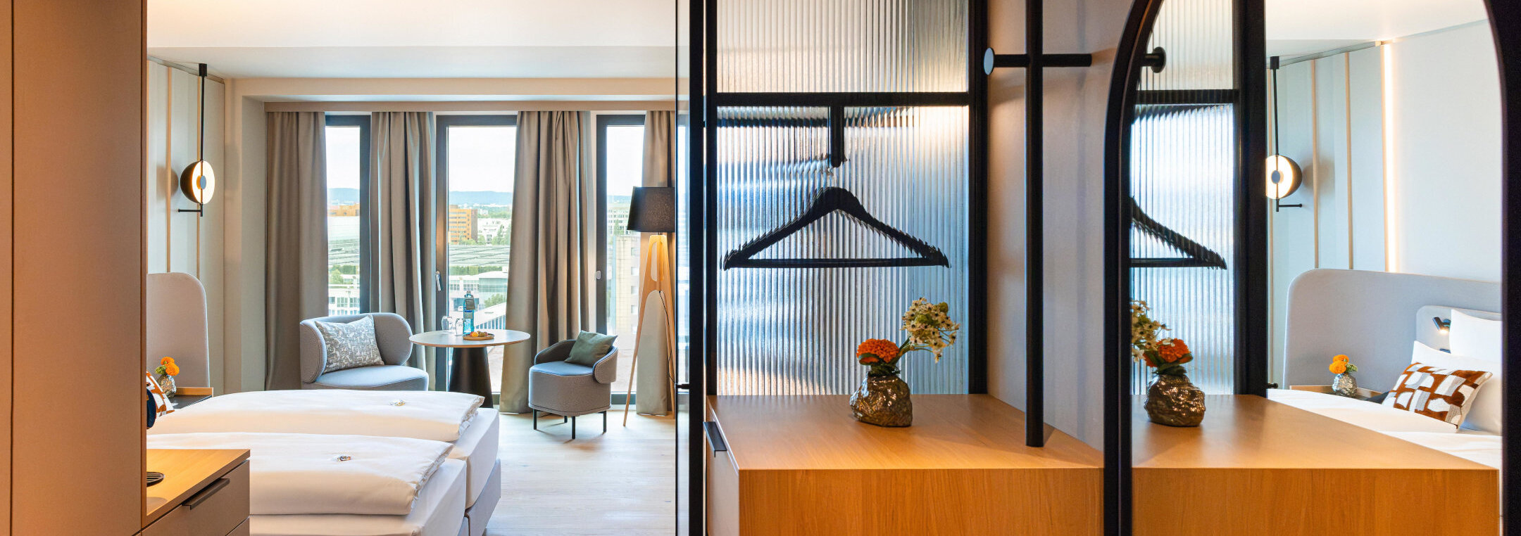 A view of the room with modern furniture and wooden accents.