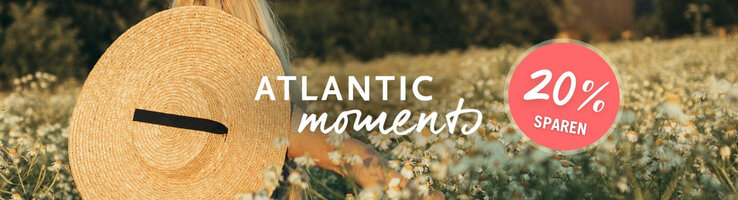 Frau mit Strohhut in Blumenfeld, Text "Atlantic Moments" und "20% sparen" auf rotem Kreis.