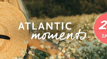 Woman with straw hat in field of flowers, text "Atlantic Moments" and "Save 20%" on red circle.