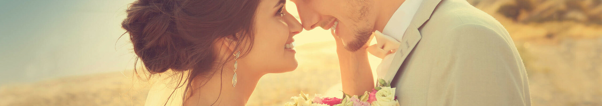 Beach wedding | ATLANTIC Grand Hotel Travemünde Young wedding couple on the beach, looking deep into each other's eyes