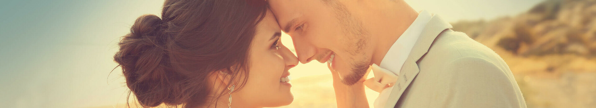Beach wedding | ATLANTIC Grand Hotel Travemünde Young wedding couple on the beach, looking deep into each other's eyes